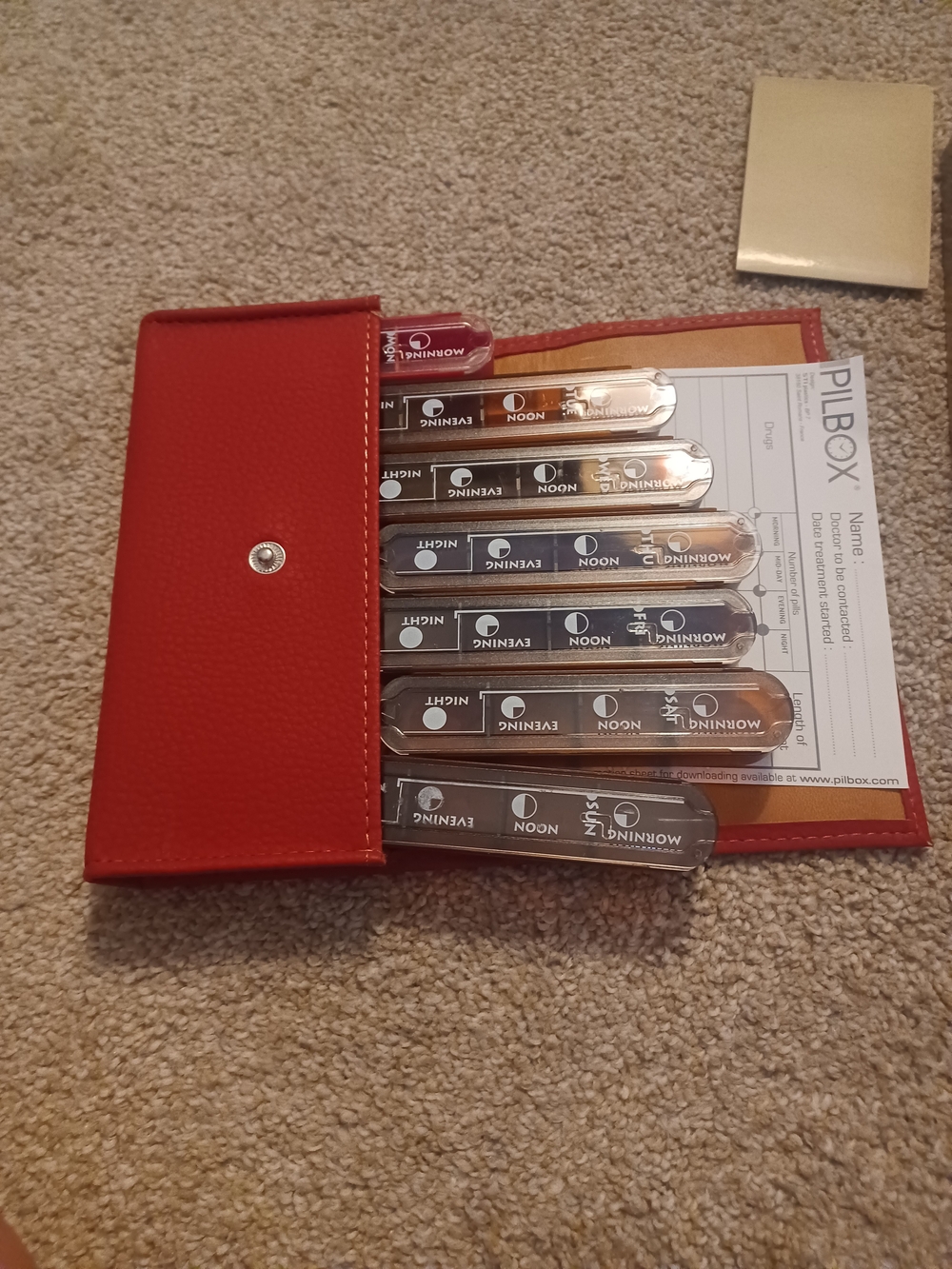 Levenger Red Daily Pill Organizer Case with Metal Tabs